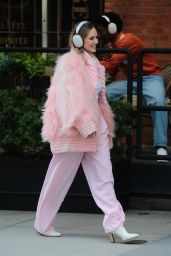 Suki Waterhouse Rocks Sonos Headphones and Pretty in Pink Attire on a Film Set in NYC 05-13-2024