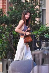 Emily Ratajkowski’s Go-To Fashion Staple: The White Satin Skirt