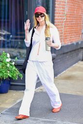 Jennifer Lawrence Rrunning Errands in All-white and Red Mesh Shoes Matching Her Cap in New York 06-26-2024