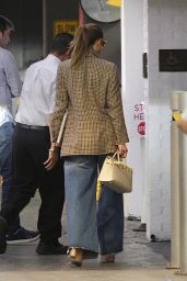 Jennifer Lopez in a Plaid Blazer and Wide Jeans Arriving to Her Office 06-05-2024