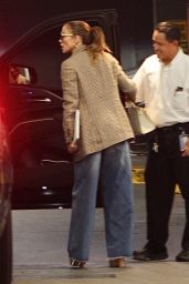 Jennifer Lopez in a Plaid Blazer and Wide Jeans Arriving to Her Office 06-05-2024