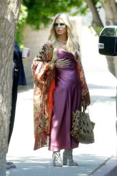 Jessica Simpson Dazzles in Pink Satin and Snakeskin at Daughter