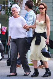 Katie Holmes With Her Mother Kathleen A. Stothers-Holmes and Her Friend Michael Fitzgerald at Sant Ambroeus Restaurant in New York 06-04-2024
