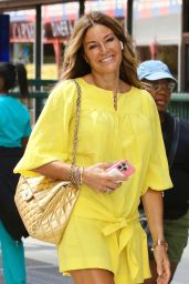 Kelly Bensimon Sorting a Vibrant Yellow Dress in Manhattan’s Midtown Area 06-27-2024