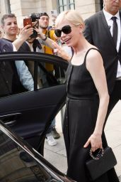 Michelle Williams Greets the Media Outside Her Hotel in Paris 06-25-2024