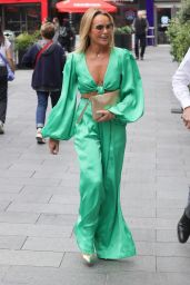 Amanda Holden Stuns in Bold Green Jumpsuit: A Masterclass in Modern Glamour