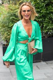 Amanda Holden Stuns in Bold Green Jumpsuit: A Masterclass in Modern Glamour