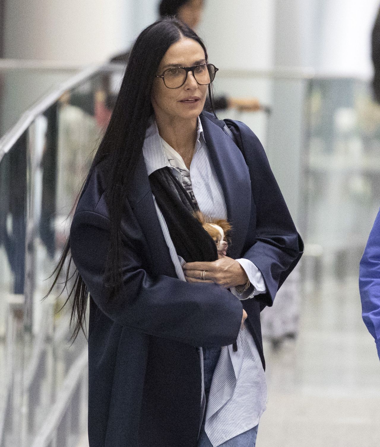 Demi Moore's Effortless Airport Chic: Ageless Beauty Arrives at TIFF 