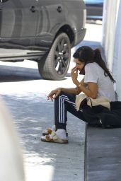 Sofia Boutella Casually Enjoys a Cigarette While Waiting for Her Car in Beverly Hills