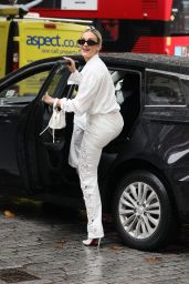 Ashley Roberts Yee-Haws Her Way into Heart Radio with Chic Cowboy-Chic Ensemble 09-30-2024.