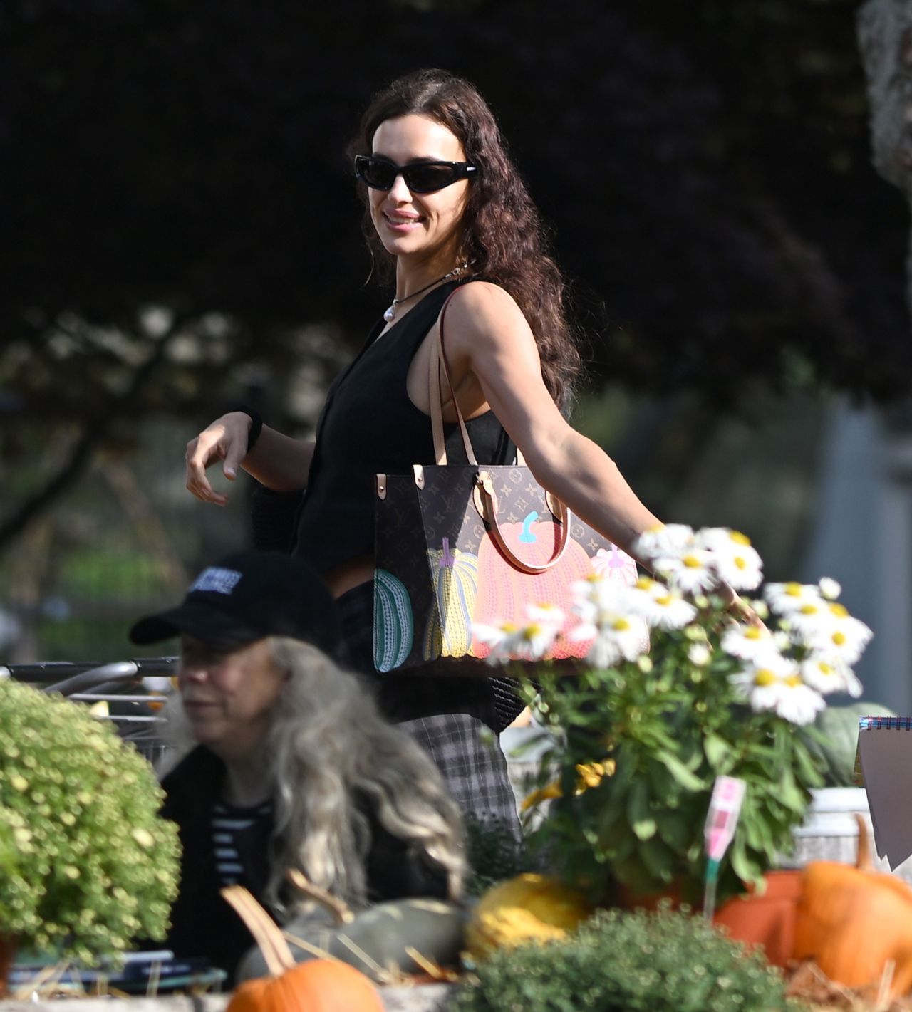 Irina Shayk Embraces Fall Festivities at The Hamptons Pumpkin Shop  10-05-2024 • CelebMafia