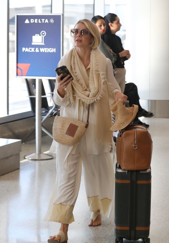 Julianne Hough Flags Down an Uber at LAX in LA [10-24-2024]