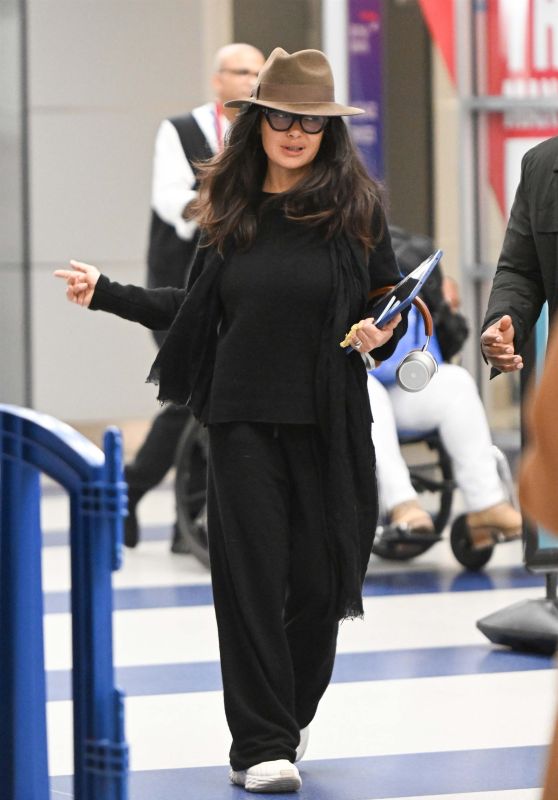 Salma Hayek Radiates Chic Comfort on Arrival at JFK in NYC [10-28-2024]