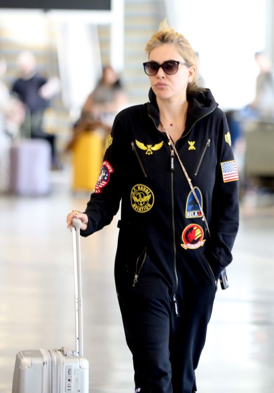 Shanna Moakler Embraces Racing Vibe in Jumpsuit Leaving LA for Dallas [10-23-2024]