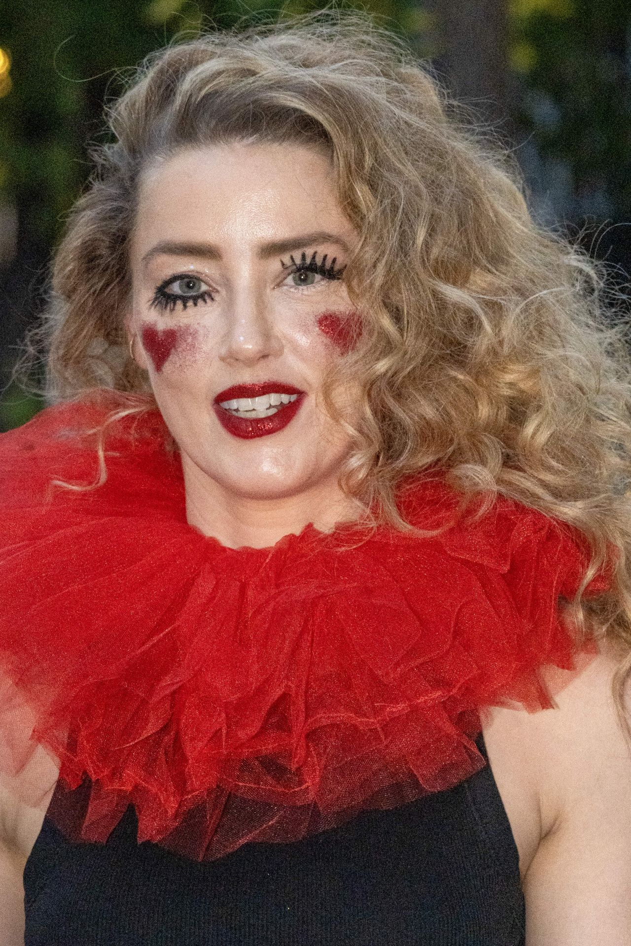 Amber Heard Clowns Around with Quirky Halloween Makeup and Fashion [10