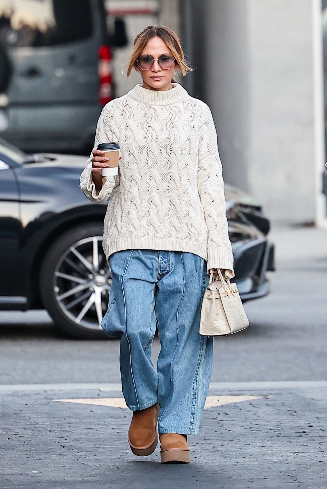 Jennifer Lopez Stuns In Cozy Fall Style: White Sweater & Barrel-Leg ...