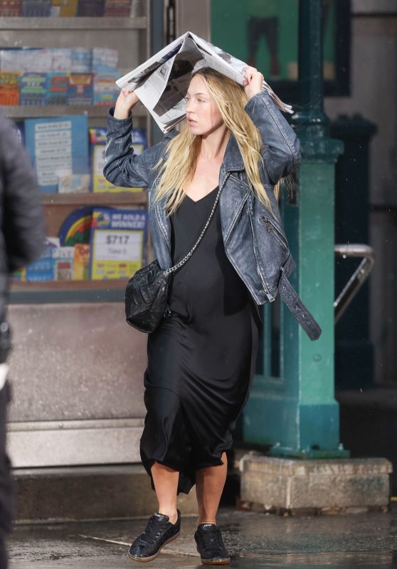 Lila Moss Dazzles in Satin Maxi Dress Amidst NYC Rain