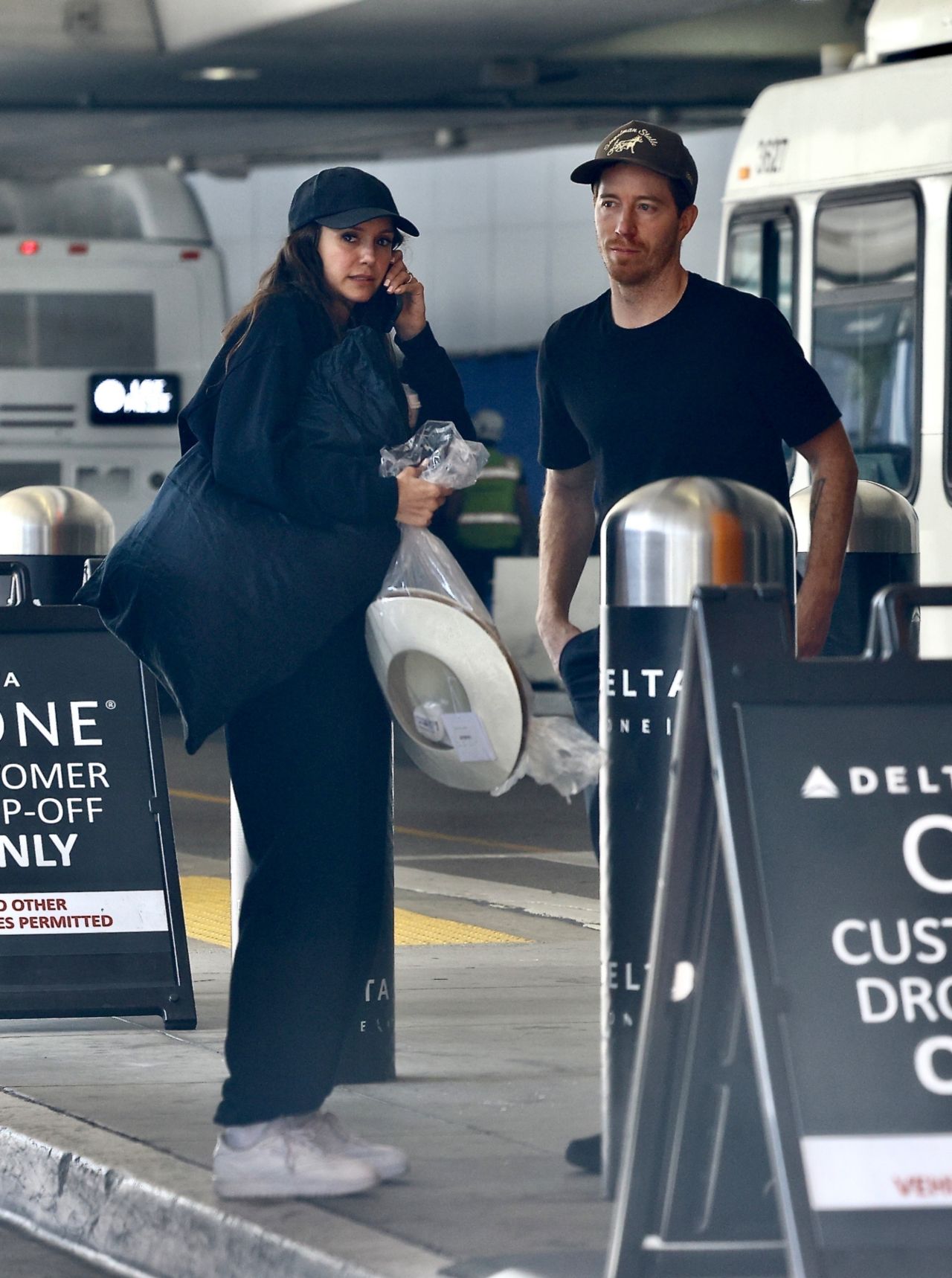 Nina Dobrev & Shaun White jet off from LAX [11022024] • CelebMafia