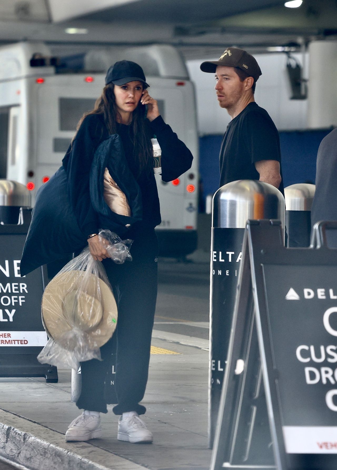 Nina Dobrev & Shaun White jet off from LAX [11022024] • CelebMafia