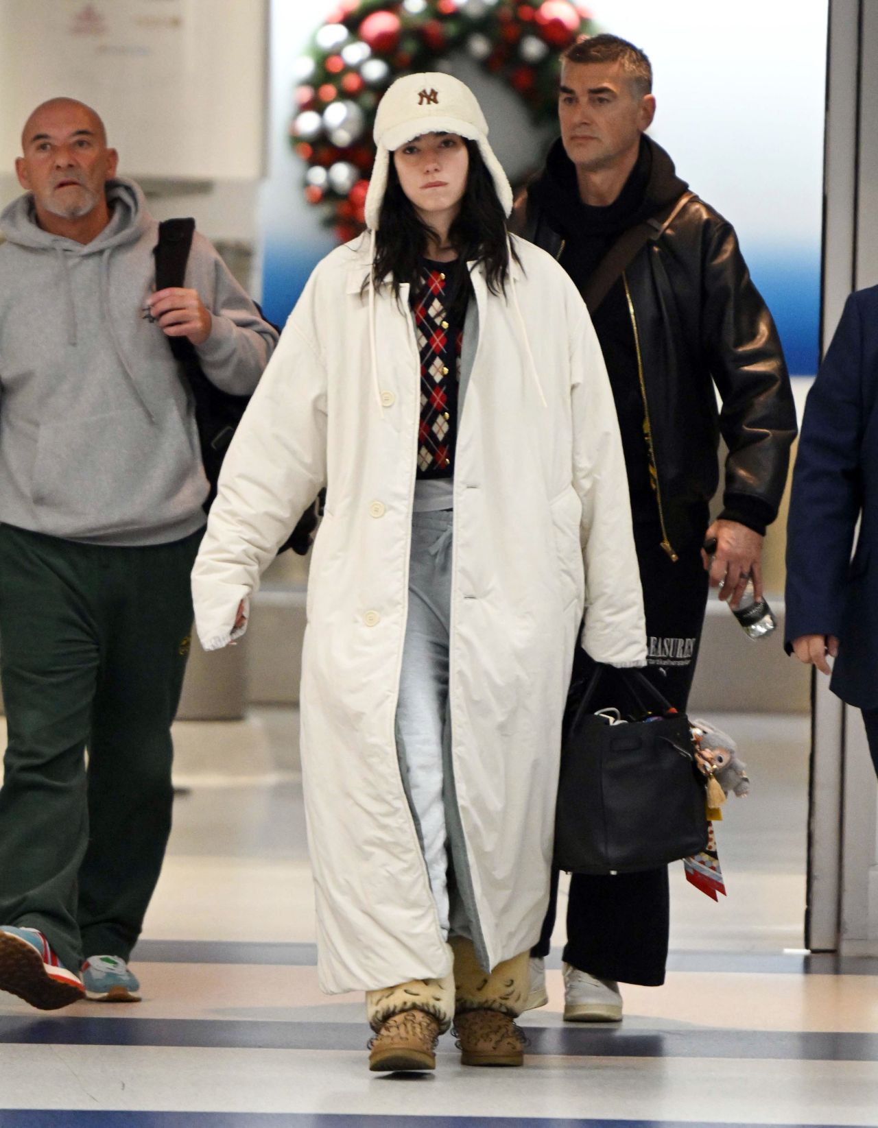 Dua Lipa Spotted Arriving at JFK Airport with Family - 12.11.2024 ...