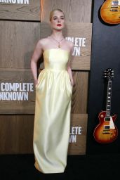 Elle Fanning Stuns in Custom Prada & Cartier at 