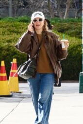 Millie Bobby Brown Beams in Style During NYC Coffee Run 12 23 2024