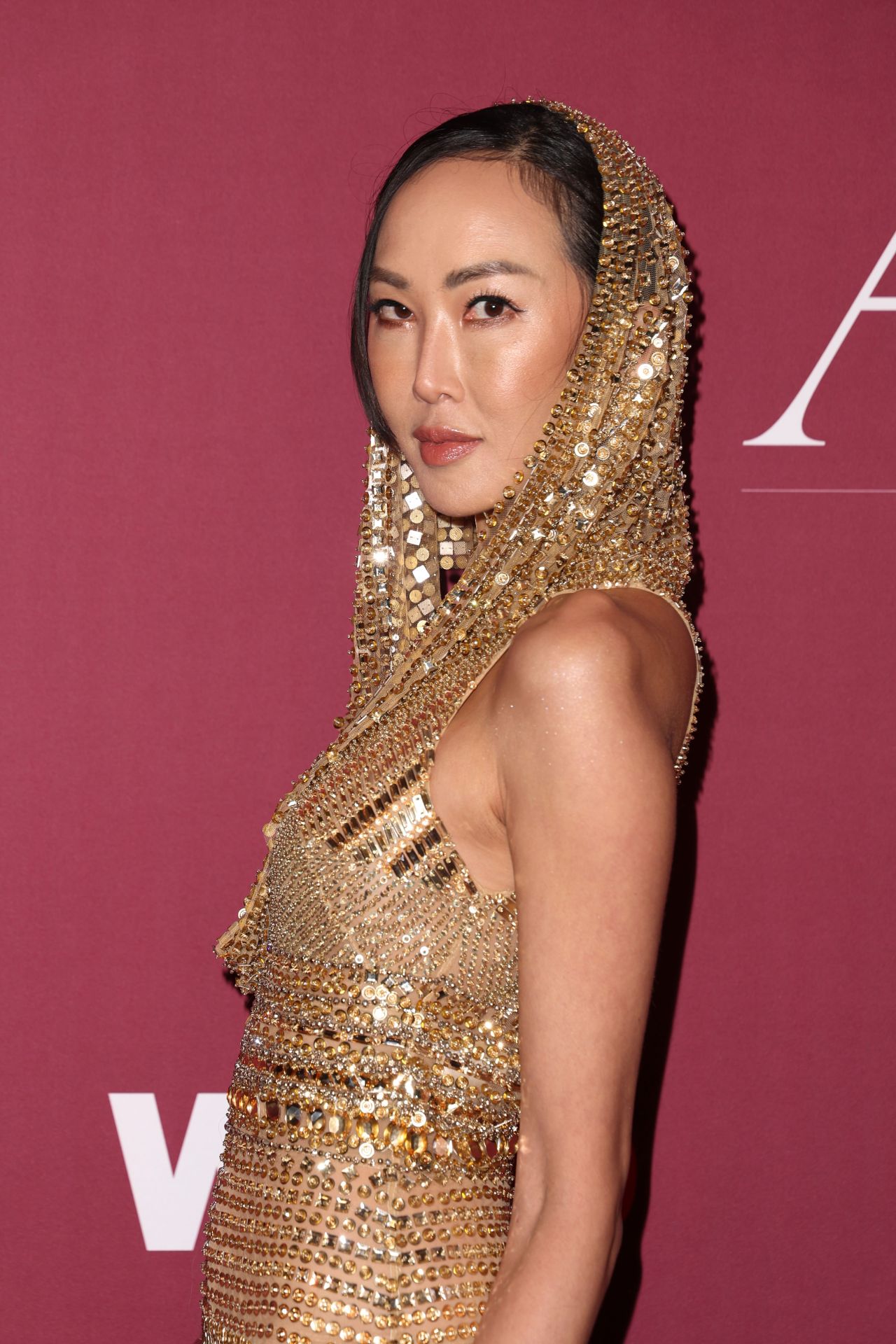 Chriselle Lim at the 2025 Golden Globes WWD Style Awards • CelebMafia