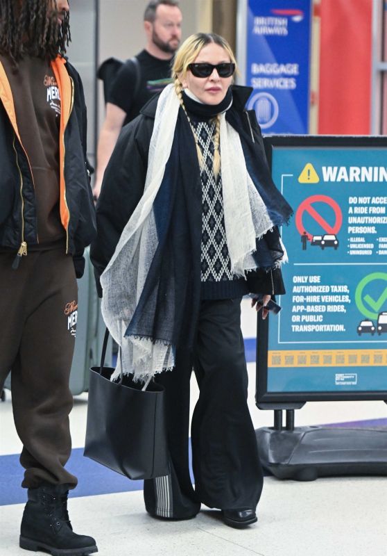 Madonna and Akeem Morris Arrive at JFK Airport - 01.07.2025