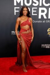 Coco Jones Stuns in Fuchsia Defaïence Gown with Bold Cutouts at 2025 Grammys