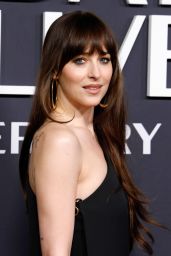 Dakota Johnson’s Gucci Gown Steals the Show at SNL 50