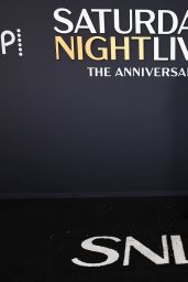 Dakota Johnson’s Gucci Gown Steals the Show at SNL 50