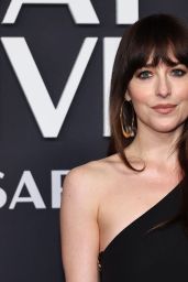 Dakota Johnson’s Gucci Gown Steals the Show at SNL 50