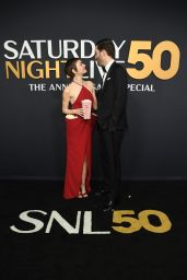 Emma Stone’s Playful Red Carpet Moment at SNL50