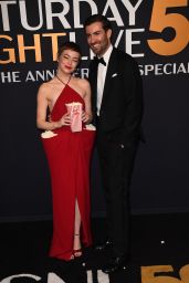 Emma Stone’s Playful Red Carpet Moment at SNL50