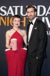 Emma Stone’s Playful Red Carpet Moment at SNL50