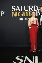 Emma Stone’s Playful Red Carpet Moment at SNL50