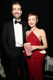Emma Stone’s Playful Red Carpet Moment at SNL50