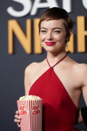 Emma Stone’s Playful Red Carpet Moment at SNL50