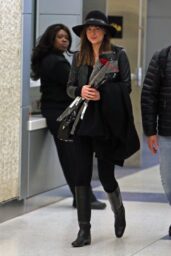 Dakota Johnson Arrives at JFK with Roses on Valentine’s Day - 02 14 2015