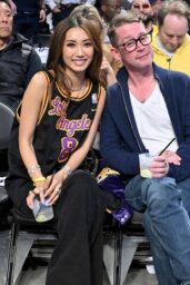 Brenda Song and Macaulay Culkin at Lakers Game