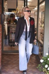 Sharon Stone Enjoys a Relaxing Pedicure While Catching Up on People Magazine