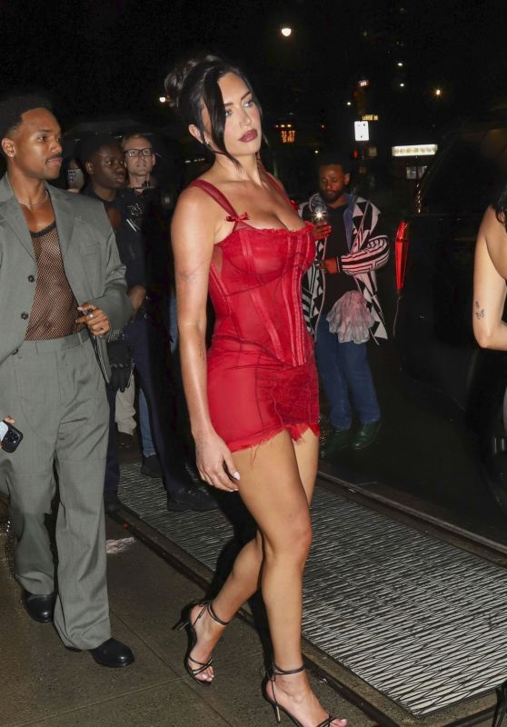 Anastasia Karanikolaou’s Striking Red Dress at Ritz-Carlton