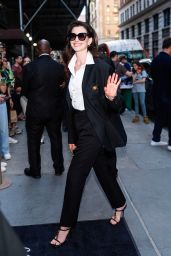 Anne Hathaway Teases Met Gala Look at Versace Party
