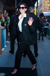 Anne Hathaway Teases Met Gala Look at Versace Party