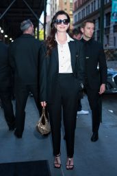 Anne Hathaway Teases Met Gala Look at Versace Party