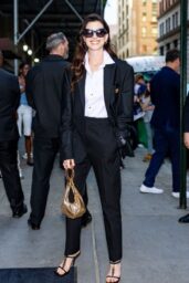 Anne Hathaway Teases Met Gala Look at Versace Party