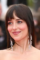 Dakota Johnson Shakes Up Cannes in Pink Gucci Fringe