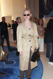 Elle Fanning’s Cartier Sunglasses & Shushu/Tong Trench at Cannes 2025