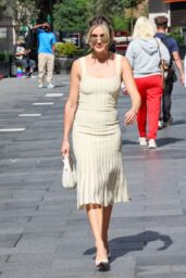 Ashley Roberts Channels Summer Ease in Cream Stripes at Heart Radio