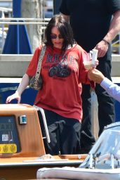 Billie Eilish Navigates Venice Canals in Casual Chic